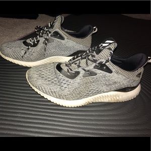 Grey and black adidas tennis shoes